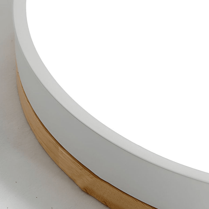 Runde Holz-Deckenlampe mit LED und Farbakzent, bietet moderne Beleuchtung und natürliches Design für Ihr Heim.