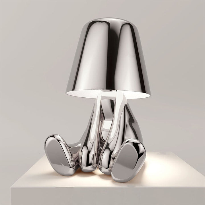 Minimalistische LED Tischlampe, kabellos, mit sanftem Stimmungslicht für eine moderne Wohndekoration.