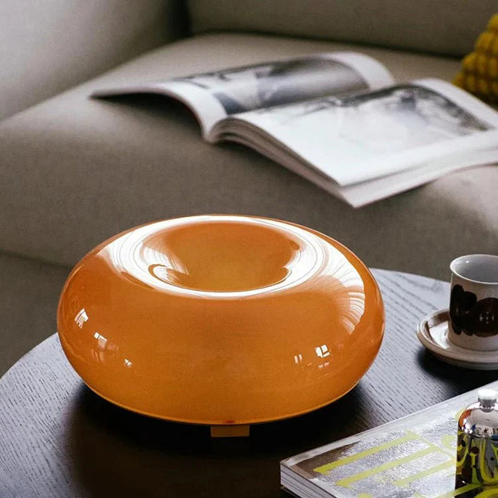 Vielseitige Donut-LED-Lampe als Tischleuchte oder Wandlampe, modernes Design für Schlafzimmer & Büro.