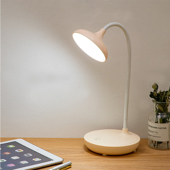 Multifunktionale LED Schreibtischlampe mit flexibler Lichtführung, USB-Ladeanschluss und intuitiver Touch-Bedienung.