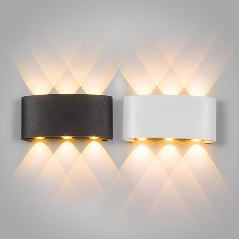 Stilvolle, moderne Wandleuchte mit integrierter LED-Technologie für eine energieeffiziente Ausleuchtung.