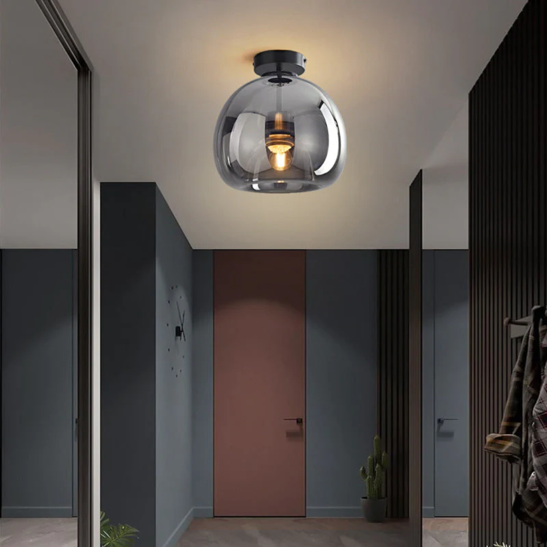 Runde LED-Deckenlampe Aurelia in Schwarz, minimalistisches Design für moderne Wohn- und Schlafräume.