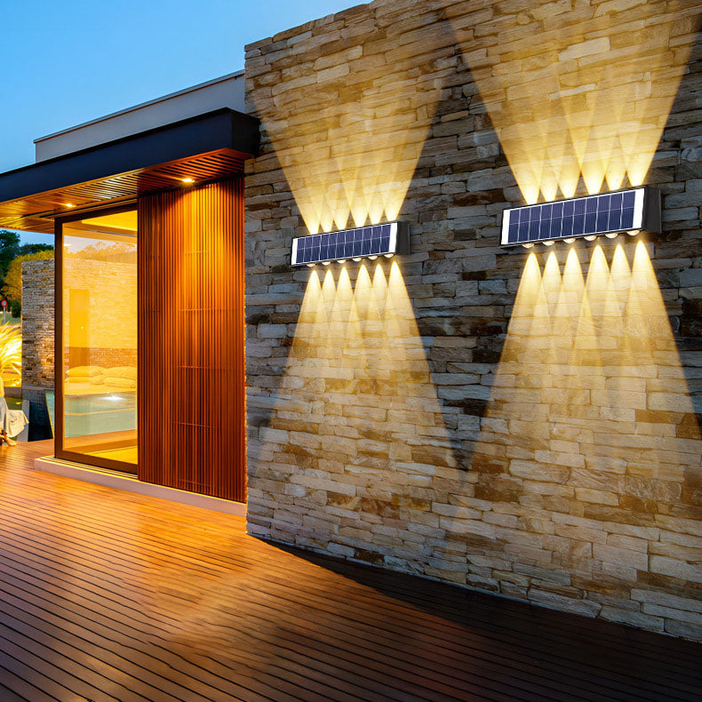 Moderne Solar-LED-Wandleuchte für Außen, wasserdicht, stilvolle Fassadenbeleuchtung.
