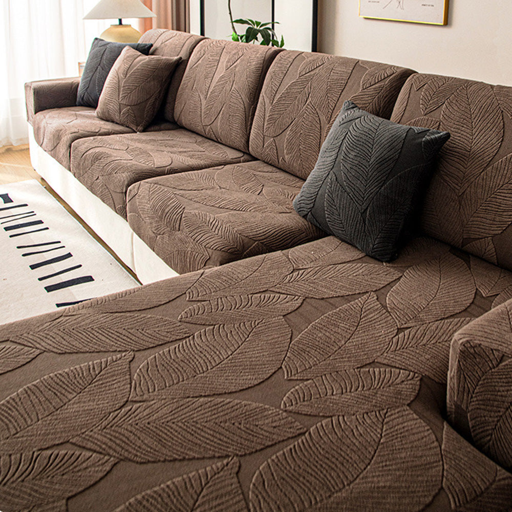 Pflegeleichter Sofabezug mit Blätterdesign. Bietet wasserabweisenden & kratzfesten Schutz für Ihr Sofa.