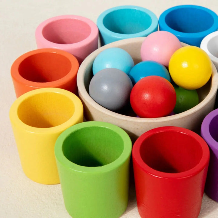 Buntes Holz-Lernspielzeug für Kinder: Greifen, Sortieren & Farben erkennen mit dem Montessori Motorikspiel.