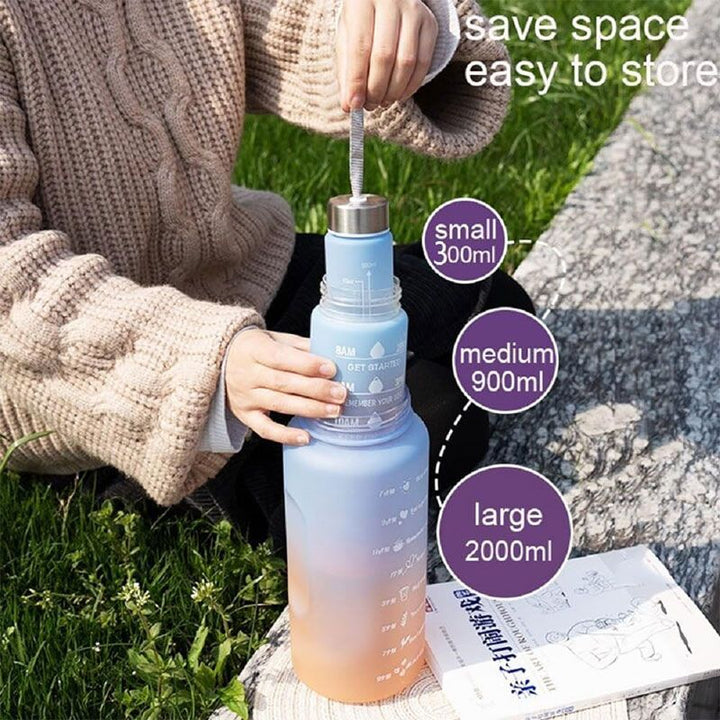 Praktische 3-in-1 Trinkflasche mit Handyhalter, Zeitmarkierungen und Motivationssprüchen, BPA-frei Tritan.