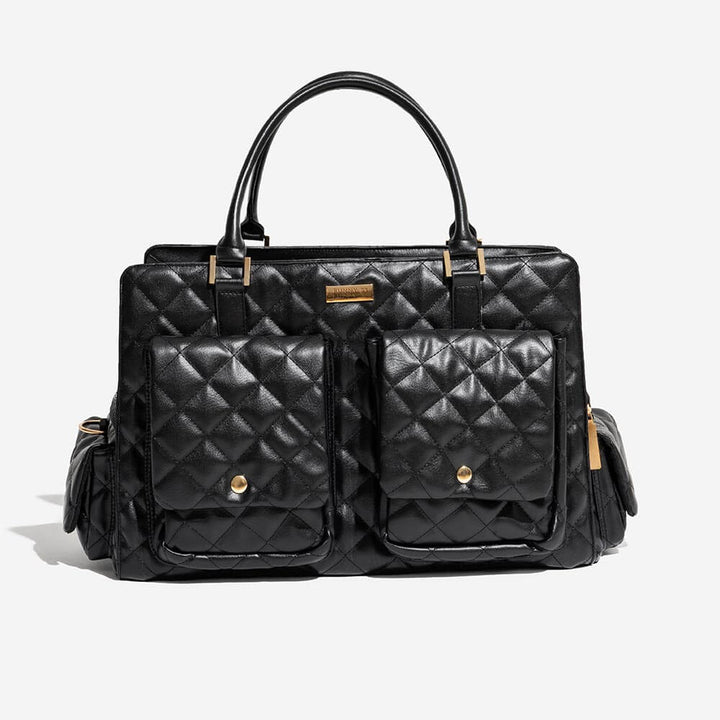 Exklusive Leder-Reisetasche für kleine Hunde, ideal für gemeinsame Stadterkundungen.