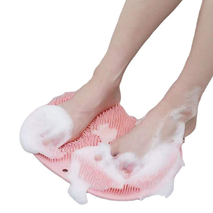Weiche Silikonmatte mit integrierten Saugnäpfen für sicheren Halt; ideal für Fußmassage & Körperpeeling.