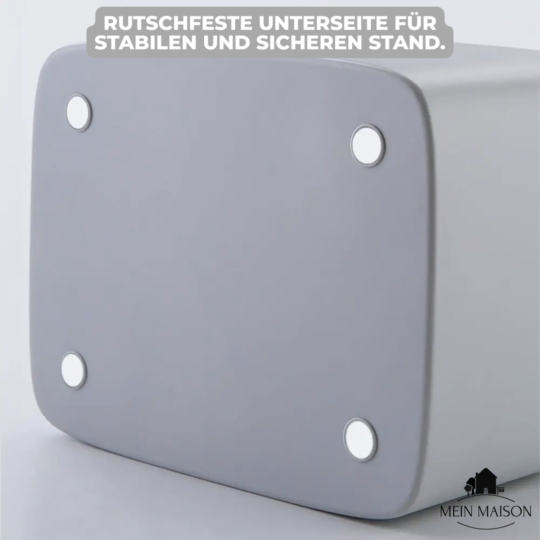 Stilvolle Taschentuchbox mit Organizerfunktion im Wohnzimmer. Bewahrt Fernbedienungen & Taschentücher.