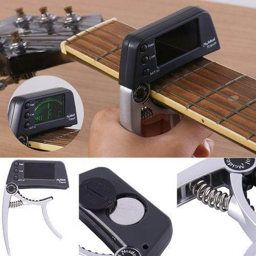 Präziser Gitarren-Tuner und Kapodaster in einem, ideal für akkurates Stimmen und Spielen an jedem Instrument.