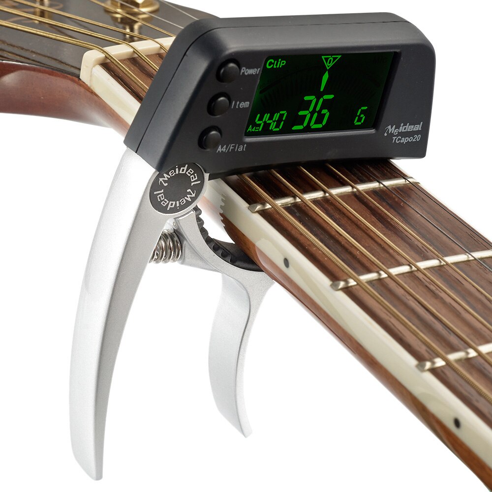 Robustes 2-in-1 Gitarrenzubehör: Kapodaster & präzises Stimmgerät aus Aluminium für alle Gitarrentypen.