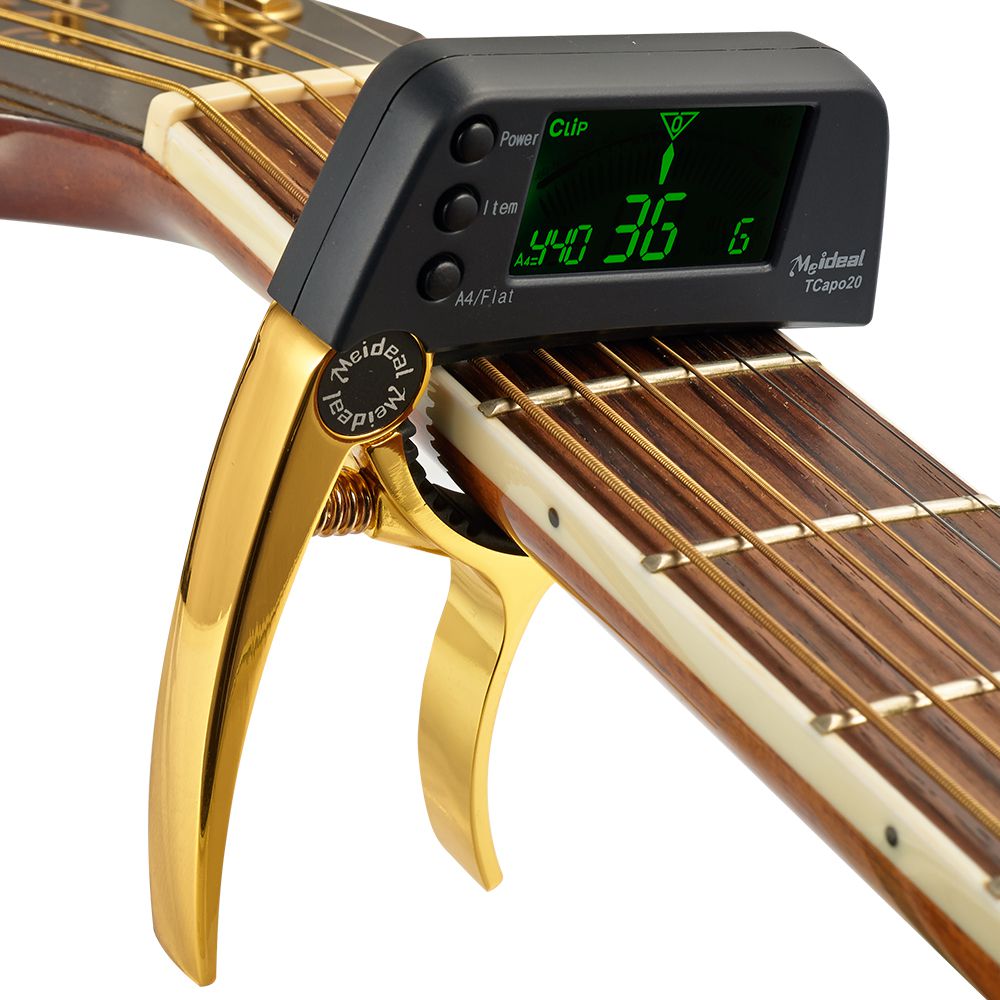 Kompaktes Gitarren-Stimmgerät und Kapodaster, 2-in-1 Lösung aus langlebigem Aluminium für unterwegs.