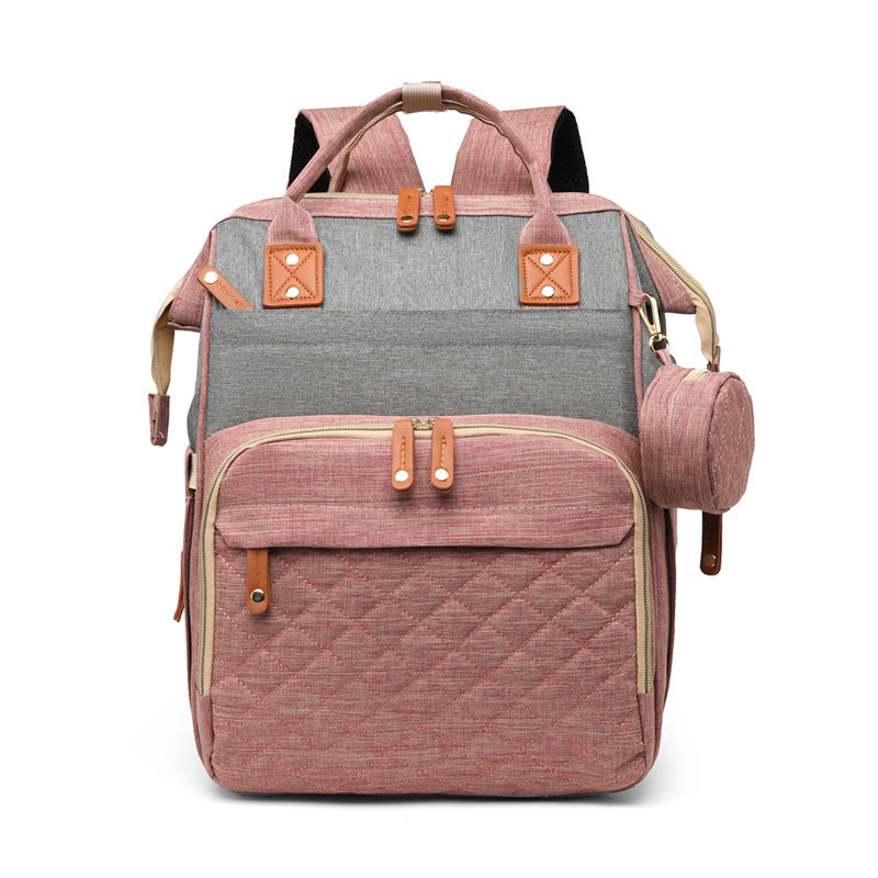 Bequemer Wickelrucksack für unterwegs; entlastet den Elternalltag mit cleveren, multifunktionalen Features.