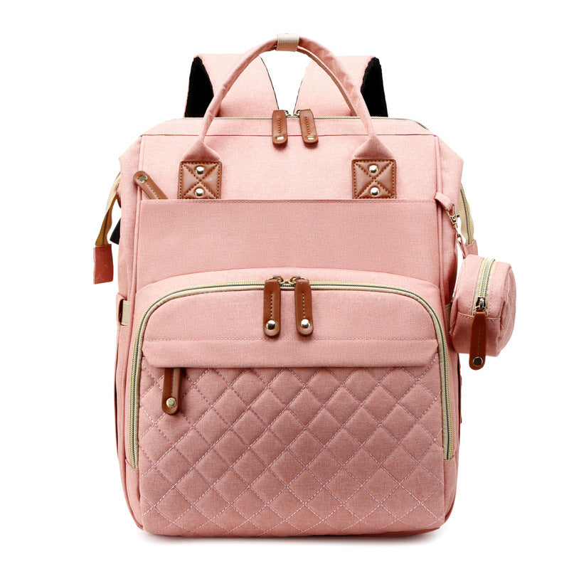 Der ultimative Wickelrucksack: Babytasche, Wickelbett & Reisebett in einem cleveren, modernen Design.