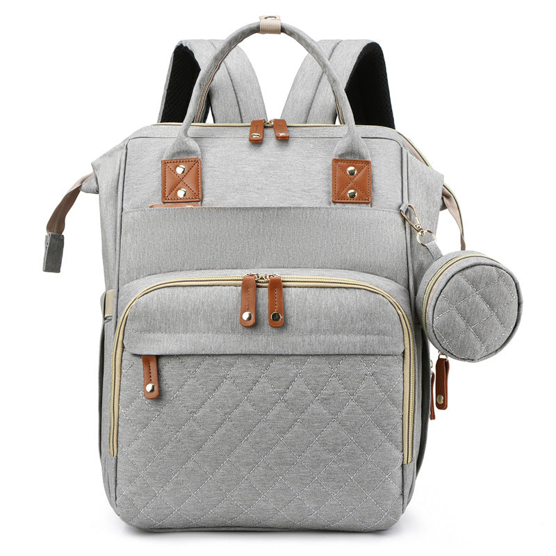Eleganter Babyrucksack in modernem Design, robust & wasserabweisend; ideal für moderne Eltern.