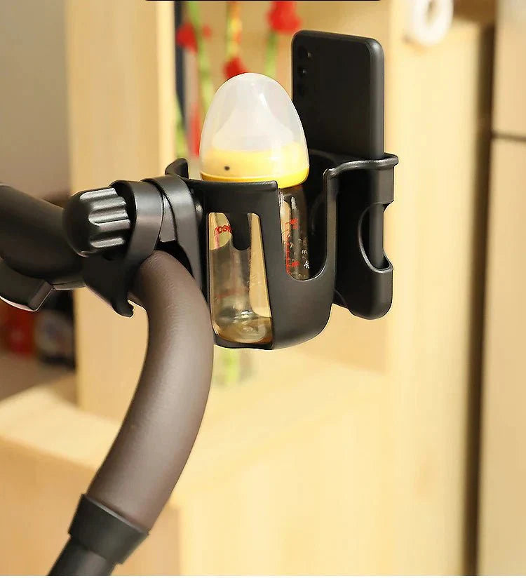 Praktischer Kinderwagen-Organizer mit Fach für Flasche und Smartphone, erleichtert den Elternalltag.