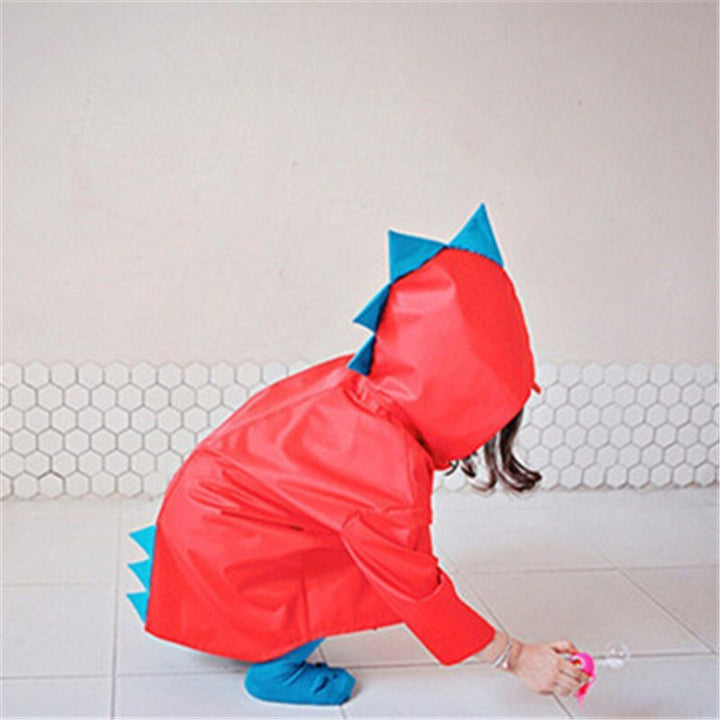 Niedlicher Kinder Regenmantel mit Dino-Motiv, wasserdicht für Outdoor-Spiel. Bunter Regenschutz für kleine Entdecker.