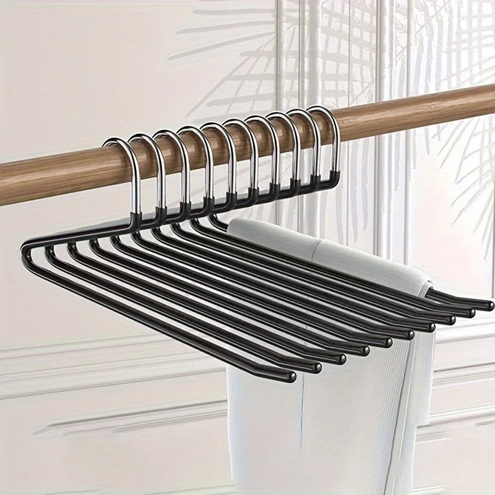 Offener Hosenbügel aus robustem, rostbeständigem Metall. Ideal für platzsparende Kleiderschrank-Ordnung.