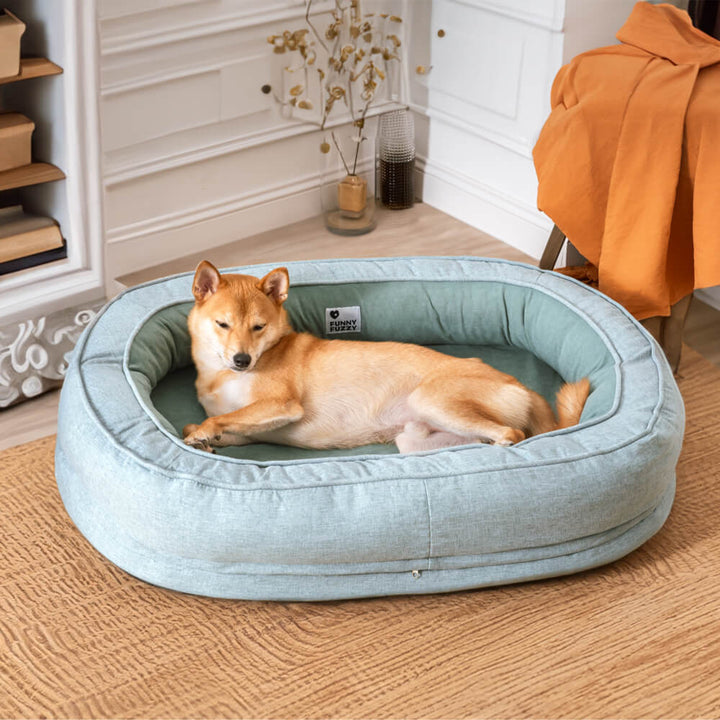 Luxuriöses orthopädisches Donut Hundebett, flauschig & waschbar für lange Freude.