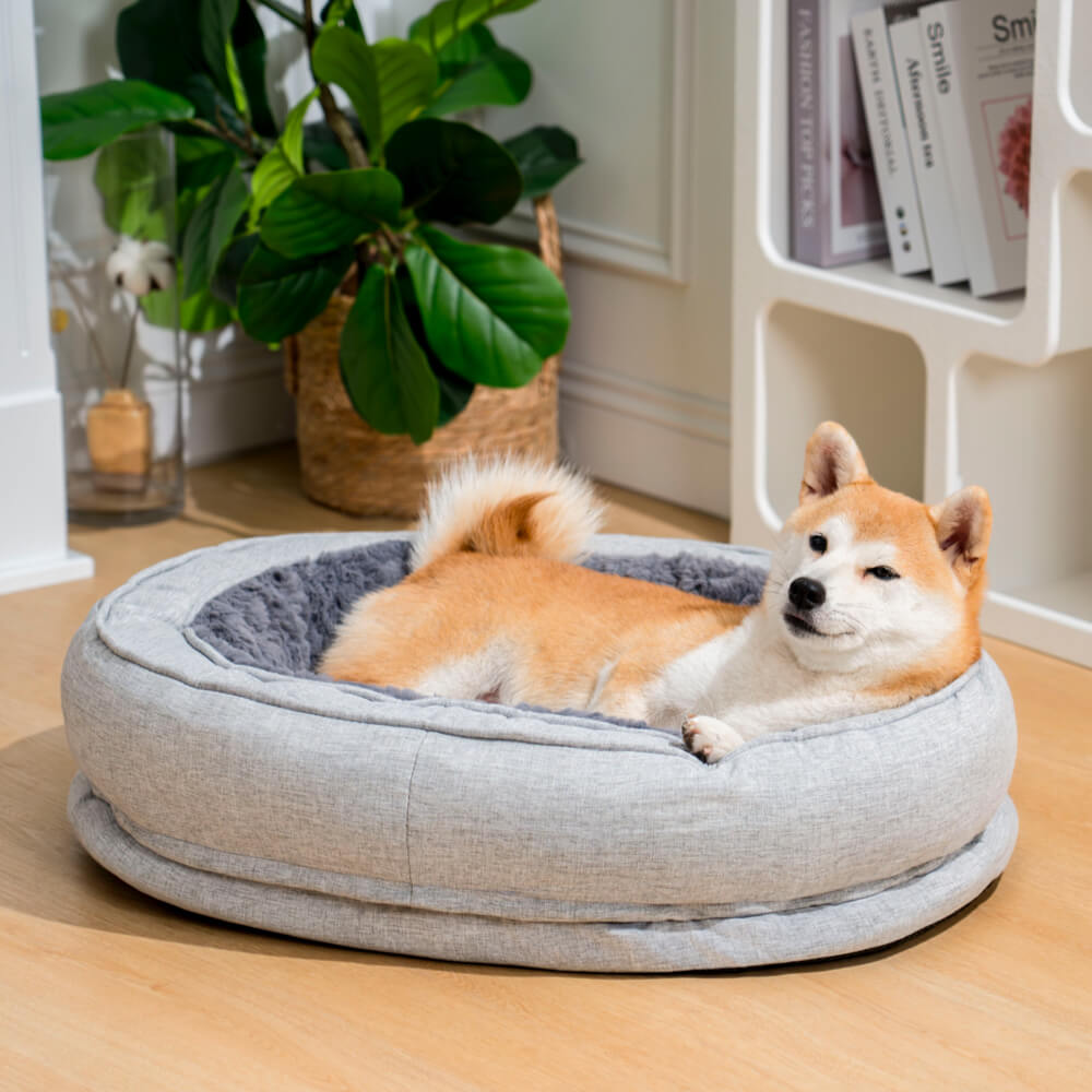 Flauschiges Donut Hundebett orthopädisch, ein warmer und gemütlicher Rückzugsort.