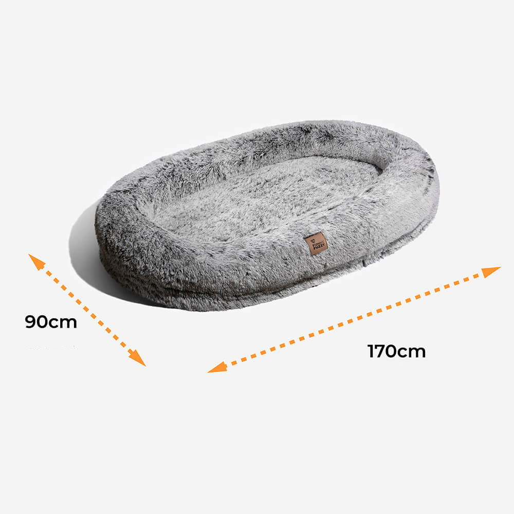 Orthopädisches Donut Hundebett, schont Gelenke und fördert den tiefen Schlaf.