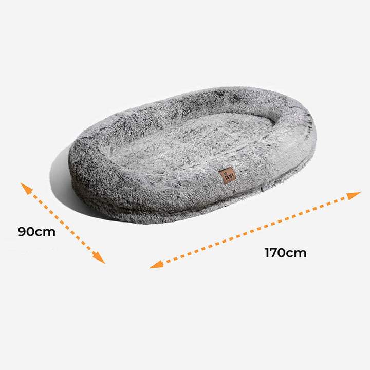 Orthopädisches Donut Hundebett, schont Gelenke und fördert den tiefen Schlaf.