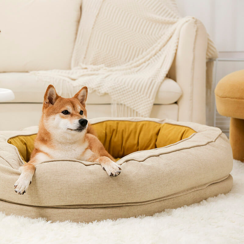 Weiches orthopädisches Donutbett, ideal für den tiefen und erholsamen Schlaf Ihres Hundes.