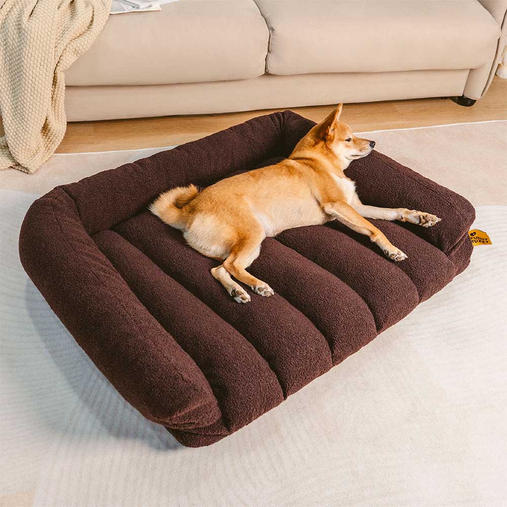 Weiches, waschbares Teddyfleece-Hundebett mit Kopfstütze, bietet Hunden warmen und orthopädischen Komfort.