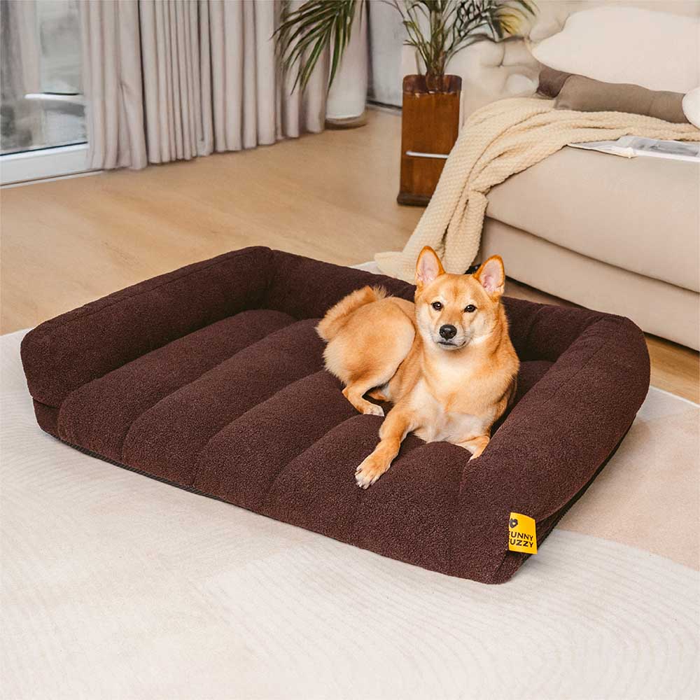Orthopädisches Haustierbett in modernem Design mit bequemer Kopfstütze und weichem Teddyfleece-Bezug.