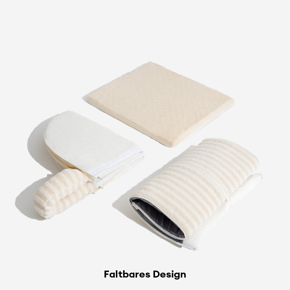 Nahaufnahme des weichen gestreiften Stoffes vom ergonomischen orthopädischen Hundebett.