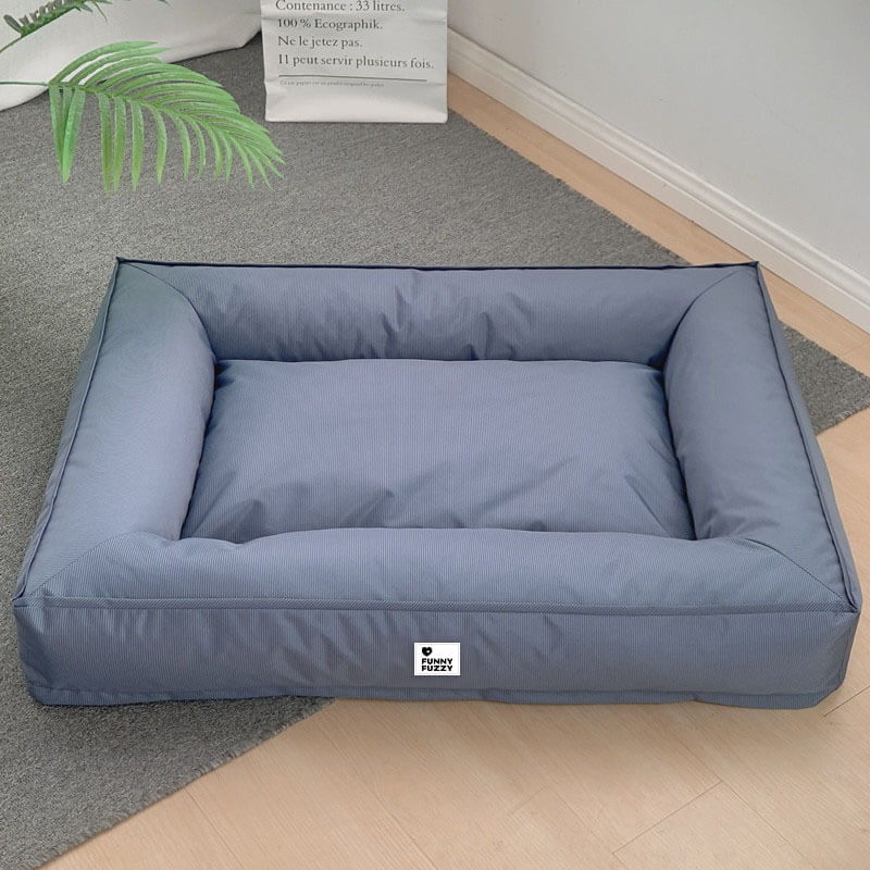 Orthopädisches Hundebett für Gelenkentlastung, wasserabweisend, robust und komfortabel.