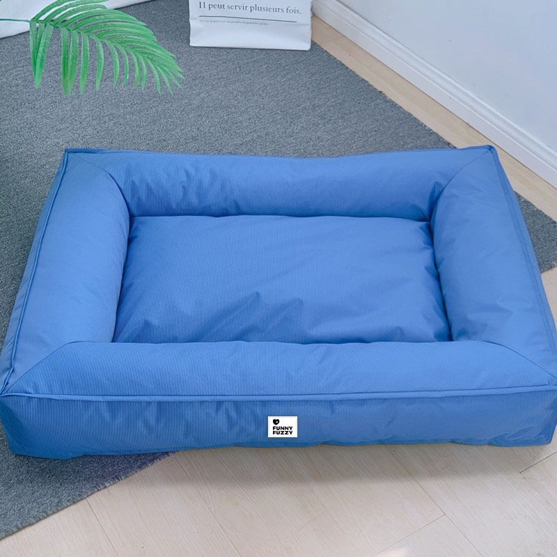 Waschbares, orthopädisches Tierbett, groß und wasserabweisend, bietet optimalen Halt für die Wirbelsäule.