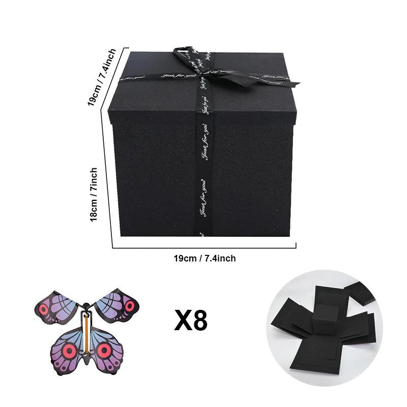 Explosionsbox-Innenseite mit Fotofächern und 8 Schmetterlingen. Personalisierte Geschenkidee.