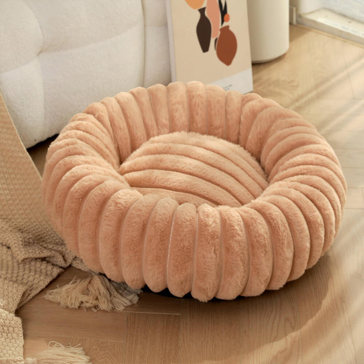 Weiches, rundes Katzenbett aus Plüsch, ideal für kleine Hunde und Katzen.