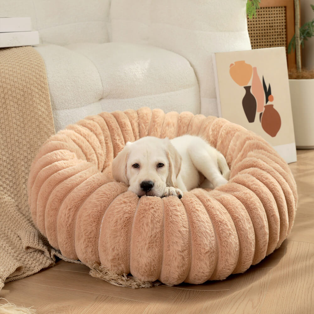 Rundes, gelenkschonendes Haustierbett aus ultraweichem Plüsch, ideal für Hunde.