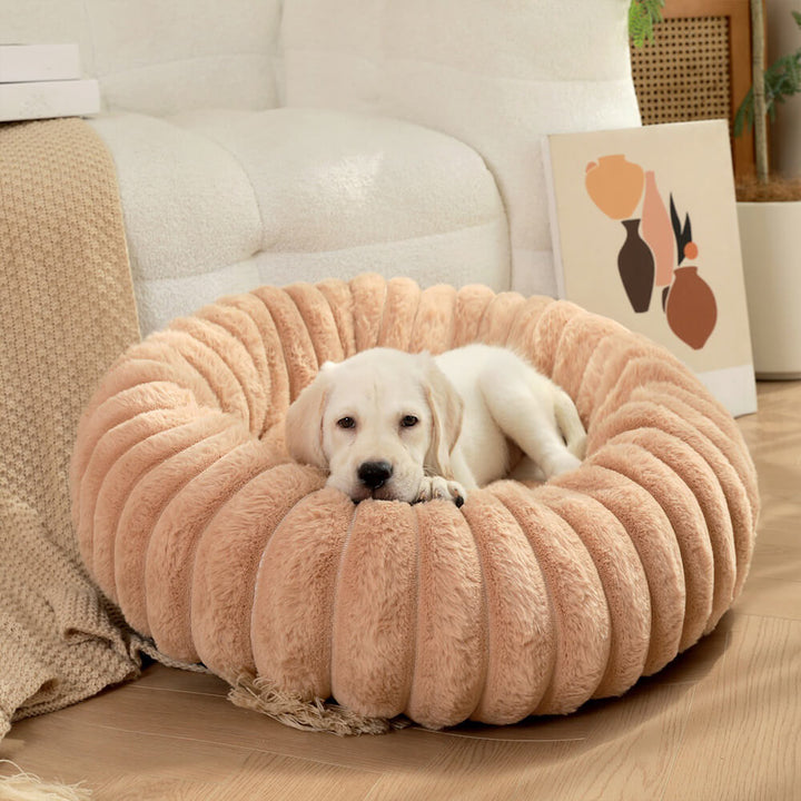 Rundes, gelenkschonendes Haustierbett aus ultraweichem Plüsch, ideal für Hunde.