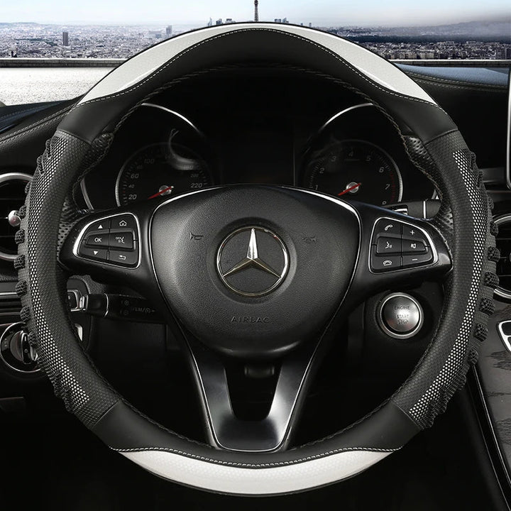Moderner Lenkradbezug aus Wabenkunstleder. Verbessert den Auto-Innenraum mit stilvollem Design und Haptik.