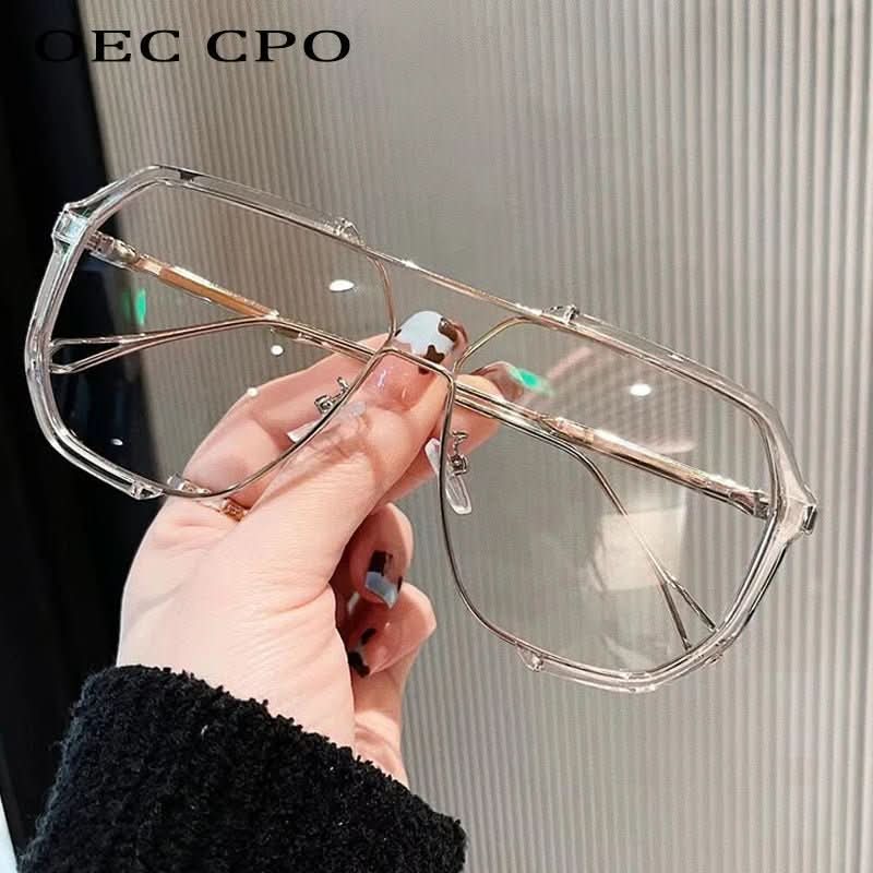 Elegante Oversize-Sonnenbrille für Damen, quadratisch, mit photochromatischen Gläsern und UV400.