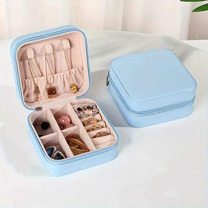 Reise-Schmuckorganizer für Damen aus elegantem PU-Leder, kompakt & stilvoll für unterwegs.