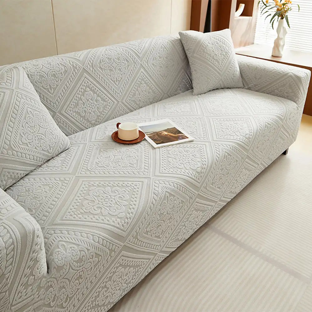 Texturierter Jacquard Sofabezug in Retro-Optik. Elastischer Couchschutz, weich & haltbar.