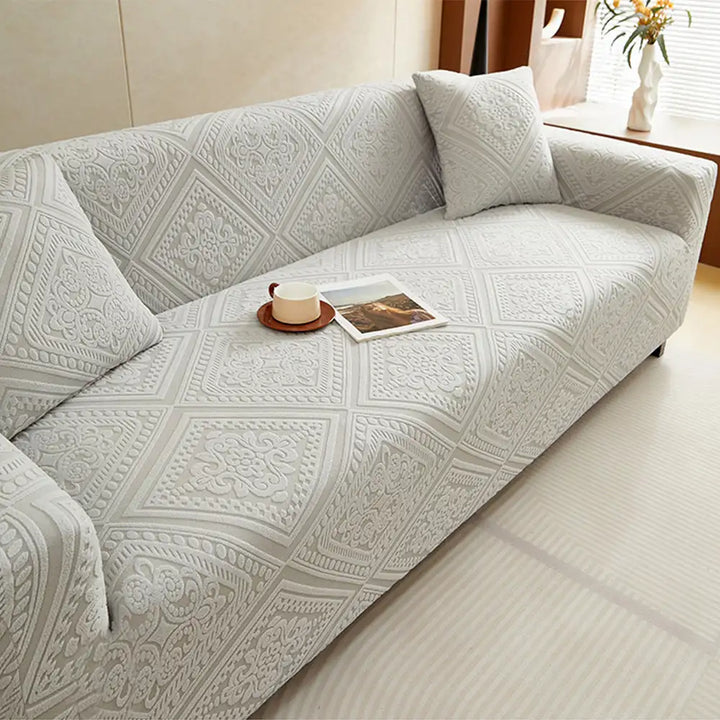 Texturierter Jacquard Sofabezug in Retro-Optik. Elastischer Couchschutz, weich & haltbar.