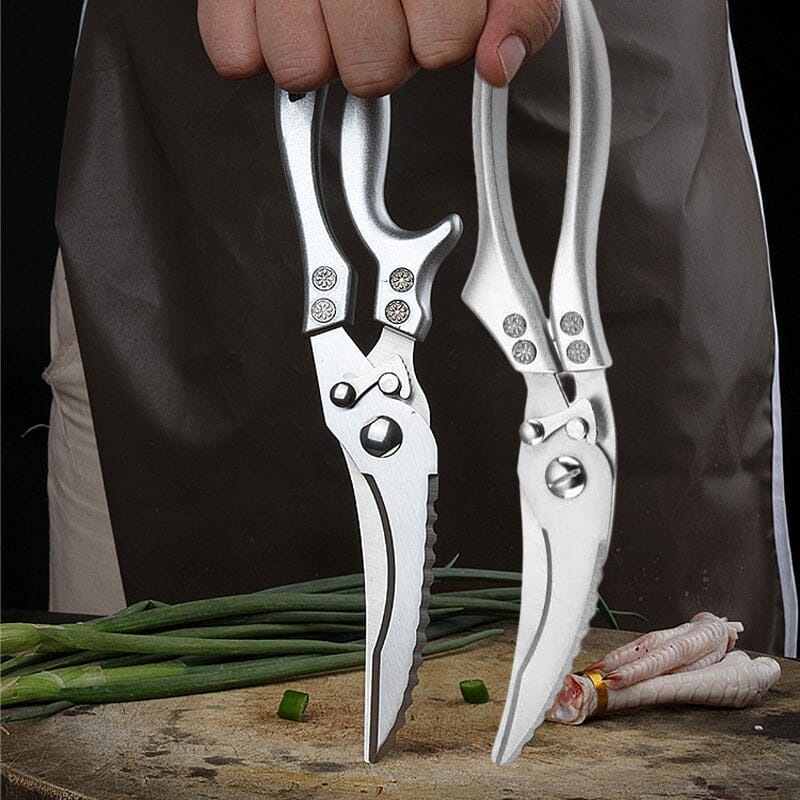Robuste Fleischschere aus Edelstahl mit ergonomischem Griff. Perfekt für präzises Schneiden.