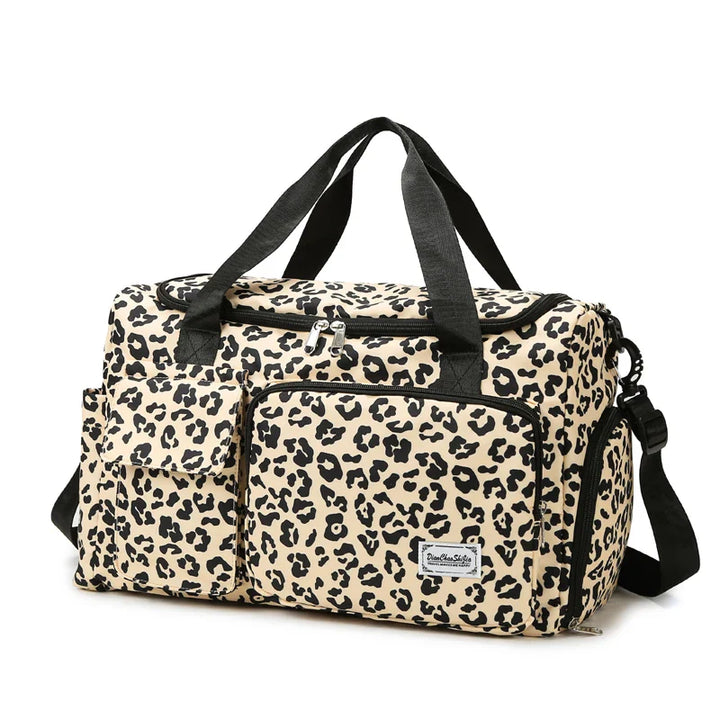 Geräumige, robuste Reisetasche in Beige, perfekt als Weekender oder Handgepäck für jede Reise.