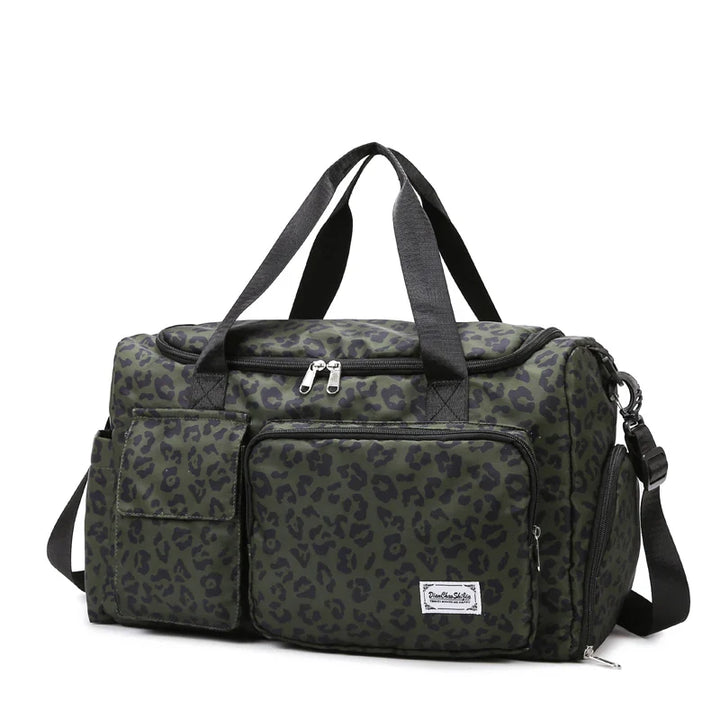 Praktischer Weekender und Handgepäck: Robuste, moderne Reisetasche in Blau für stilvolle Trips.