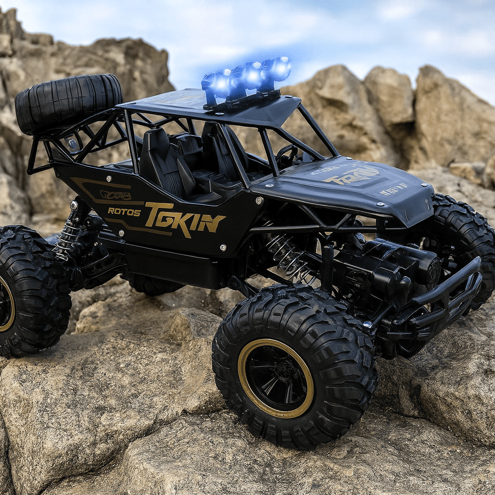 Detaillierte Ansicht des BEASTTREK X4 RC Monstertrucks, große Reifen und robuste Federung.