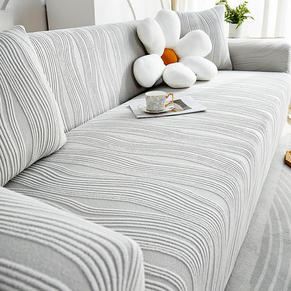 Robuster Jacquard-Sofabezug, elastisch & kratzfest, idealer Möbelschutz für Ihr Wohnzimmer.