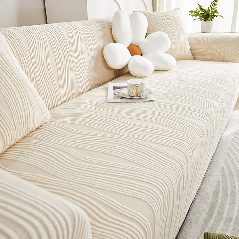 Nahaufnahme des Jacquard-Sofabezugs, zeigt die robuste, elastische Textur, perfekt für Haustiere.