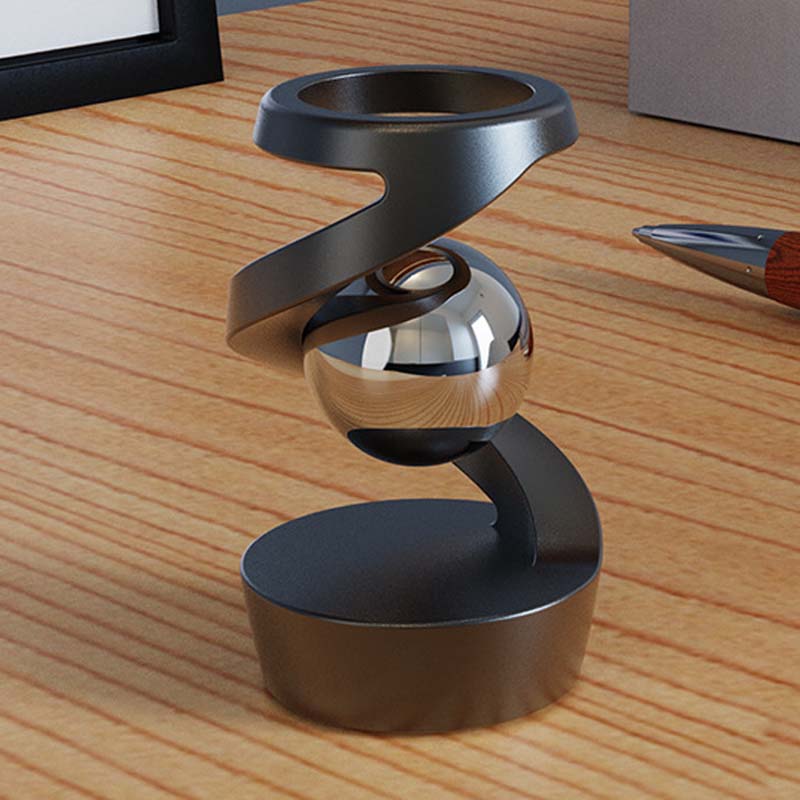 Silbernes Gyroskop als stilvolle Schreibtisch-Deko, hilft bei Konzentration im Büroalltag & Anti-Stress.