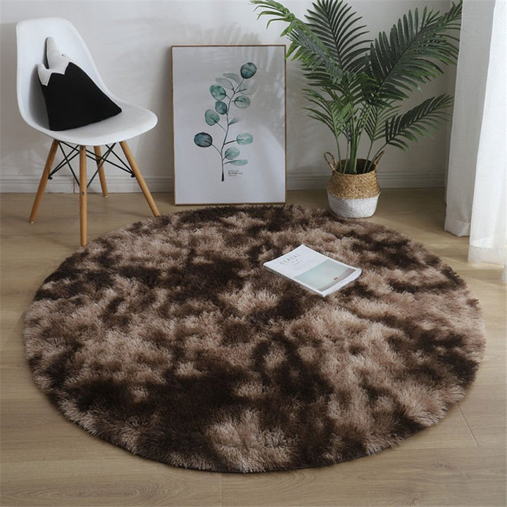 Runder Teppich aus Polyester, flauschig und sehr weich. Gemütliche Ergänzung für Ihr Zuhause.