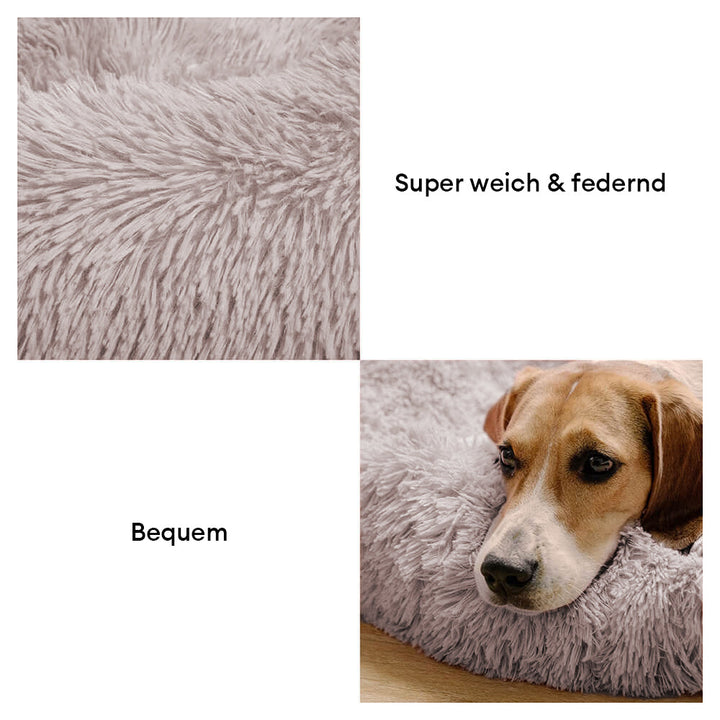 Flauschiges, rundes Hundebett in neutraler Farbe. Bietet Komfort & Sicherheit für ängstliche Hunde.